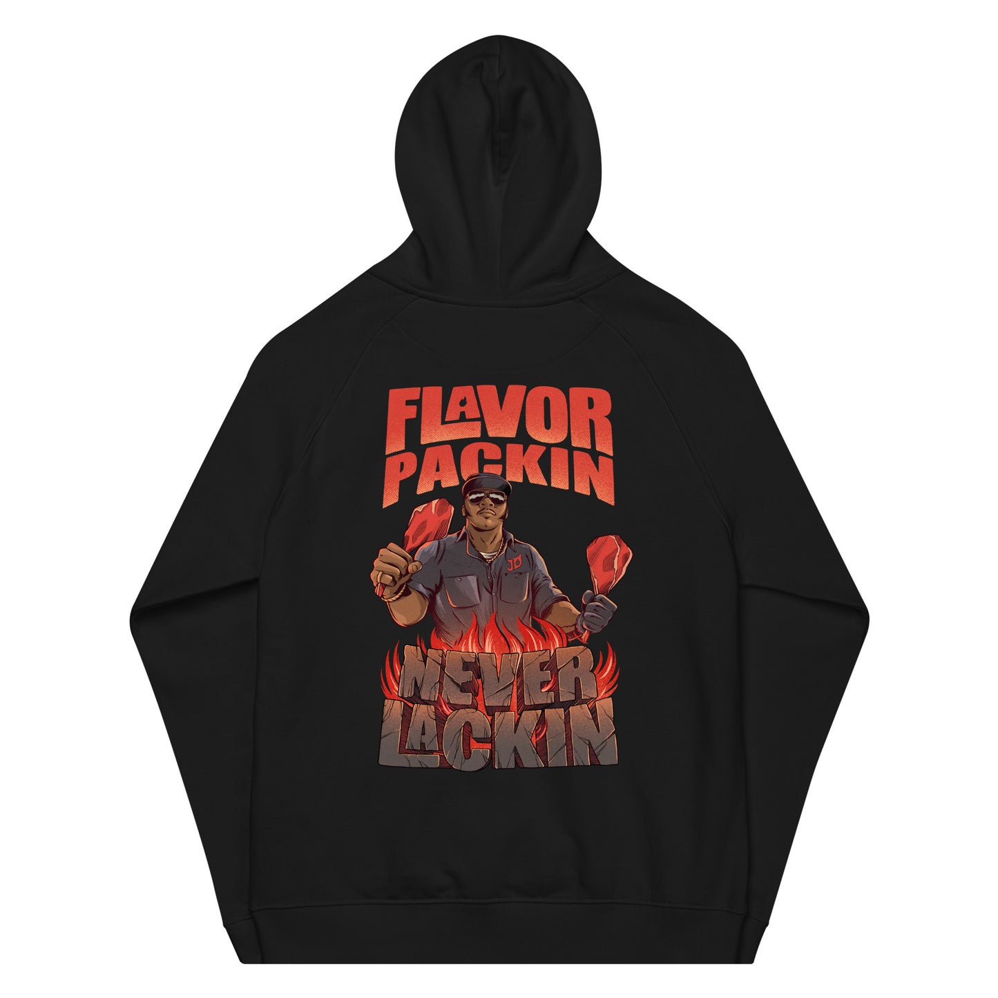 The back of a black hooded sweatshirt with the phrase "Flavor Packin Never Lackin" in red with a man holding two bone in meats over flames 